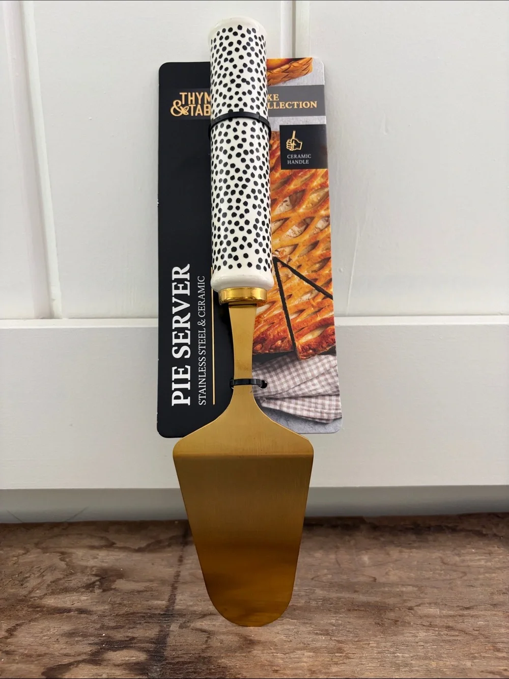 Gold Pie Server with White and Black Speckled Handle